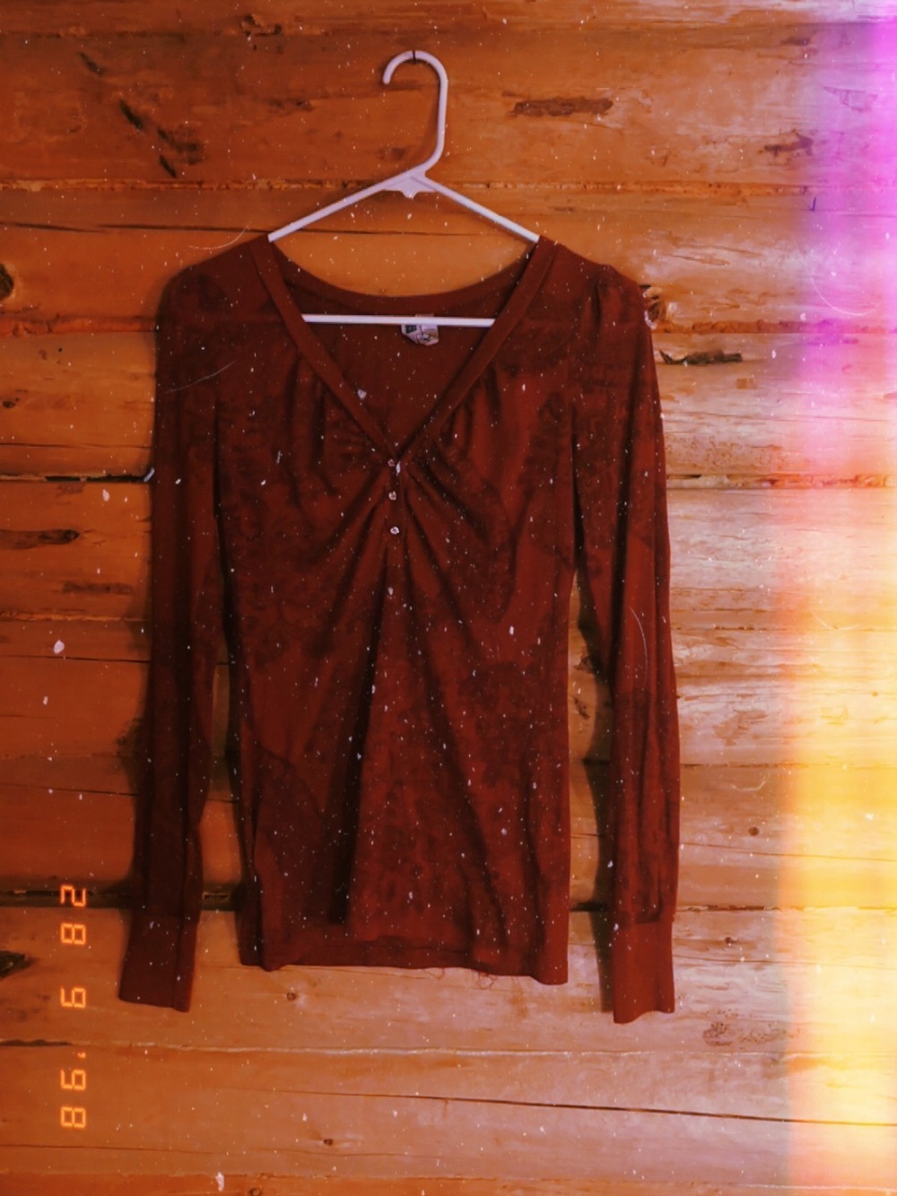Buckle long sleeve burgundy top
